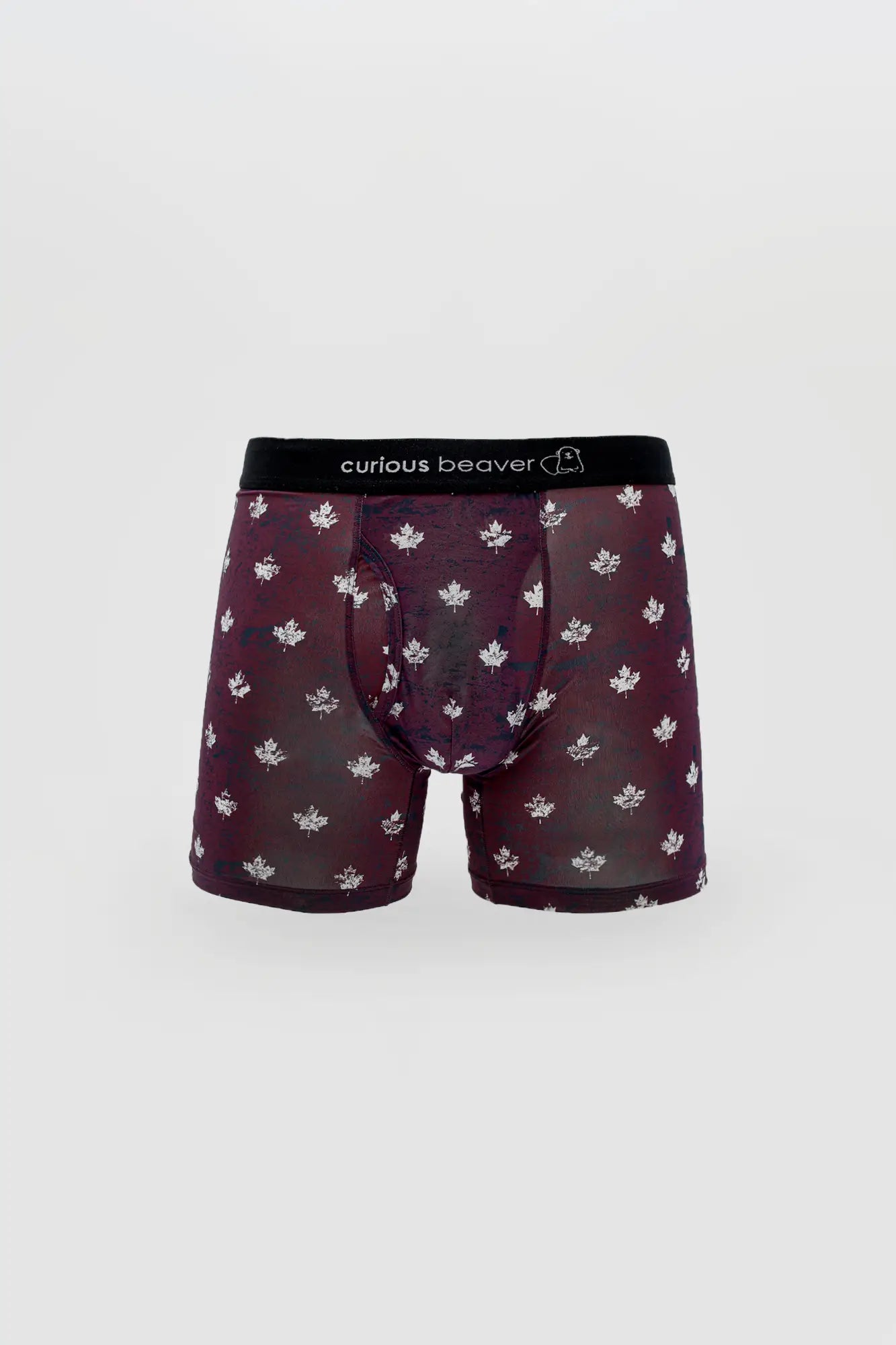 Men’s maroon boxer briefs with white maple leaf pattern and black waistband branded curious beaver canada flag design