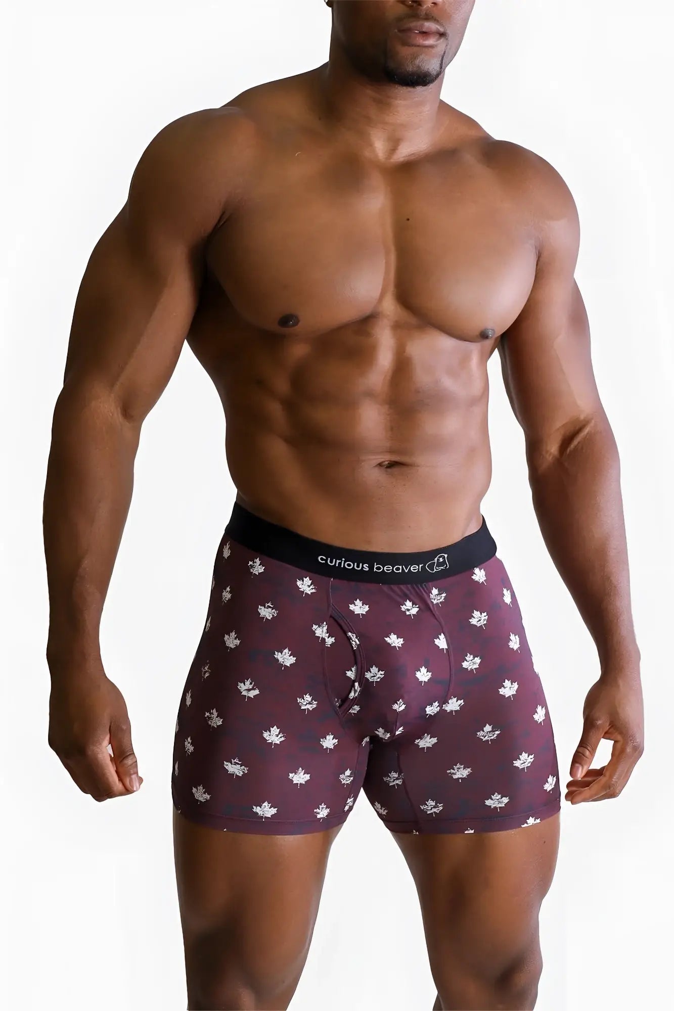 Men’s maroon boxer briefs with white maple leaf pattern and black curious beaver waistband canada flag design