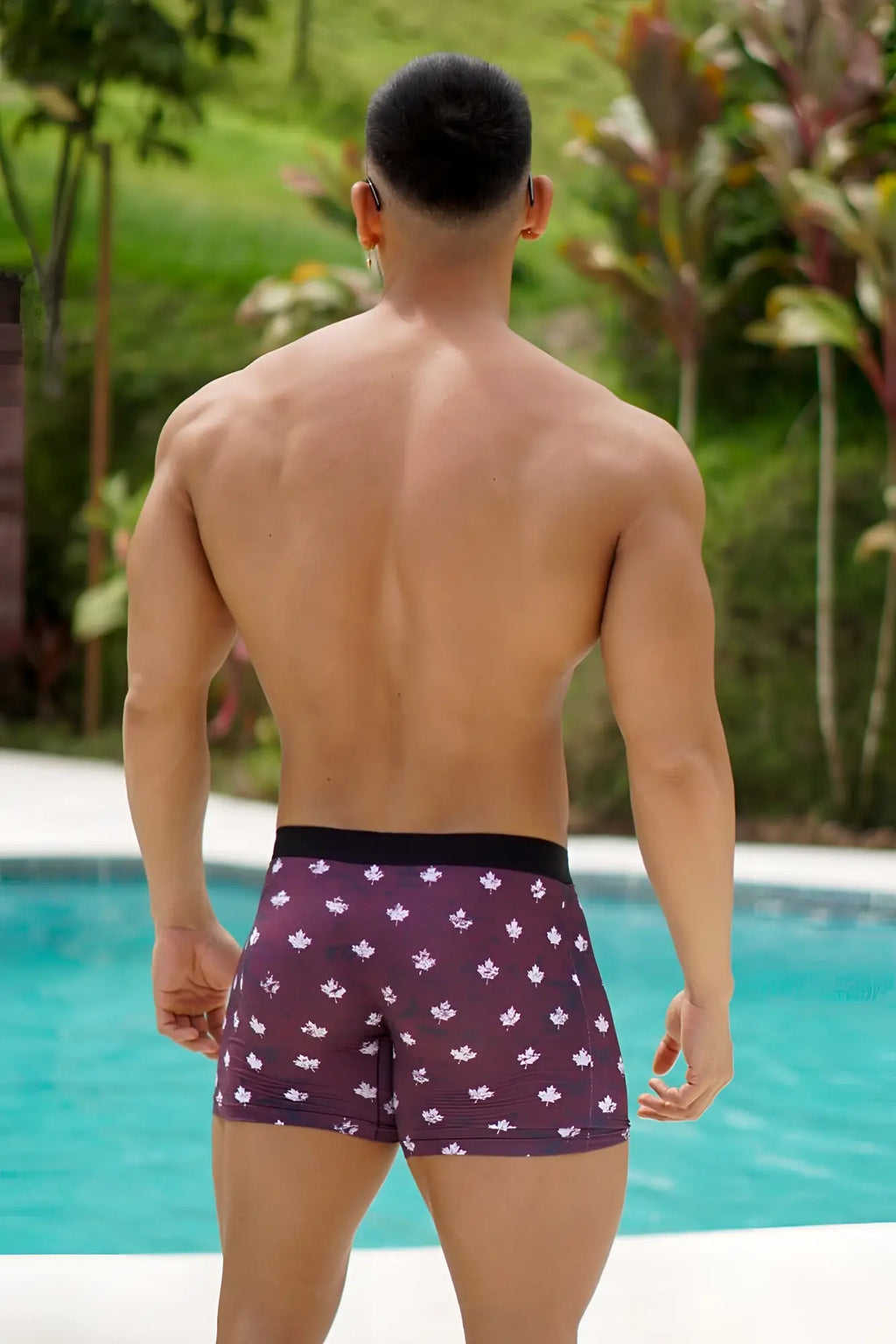 Men’s boxer briefs with canada flag design purple swim trunks with white floral pattern and black waistband front view