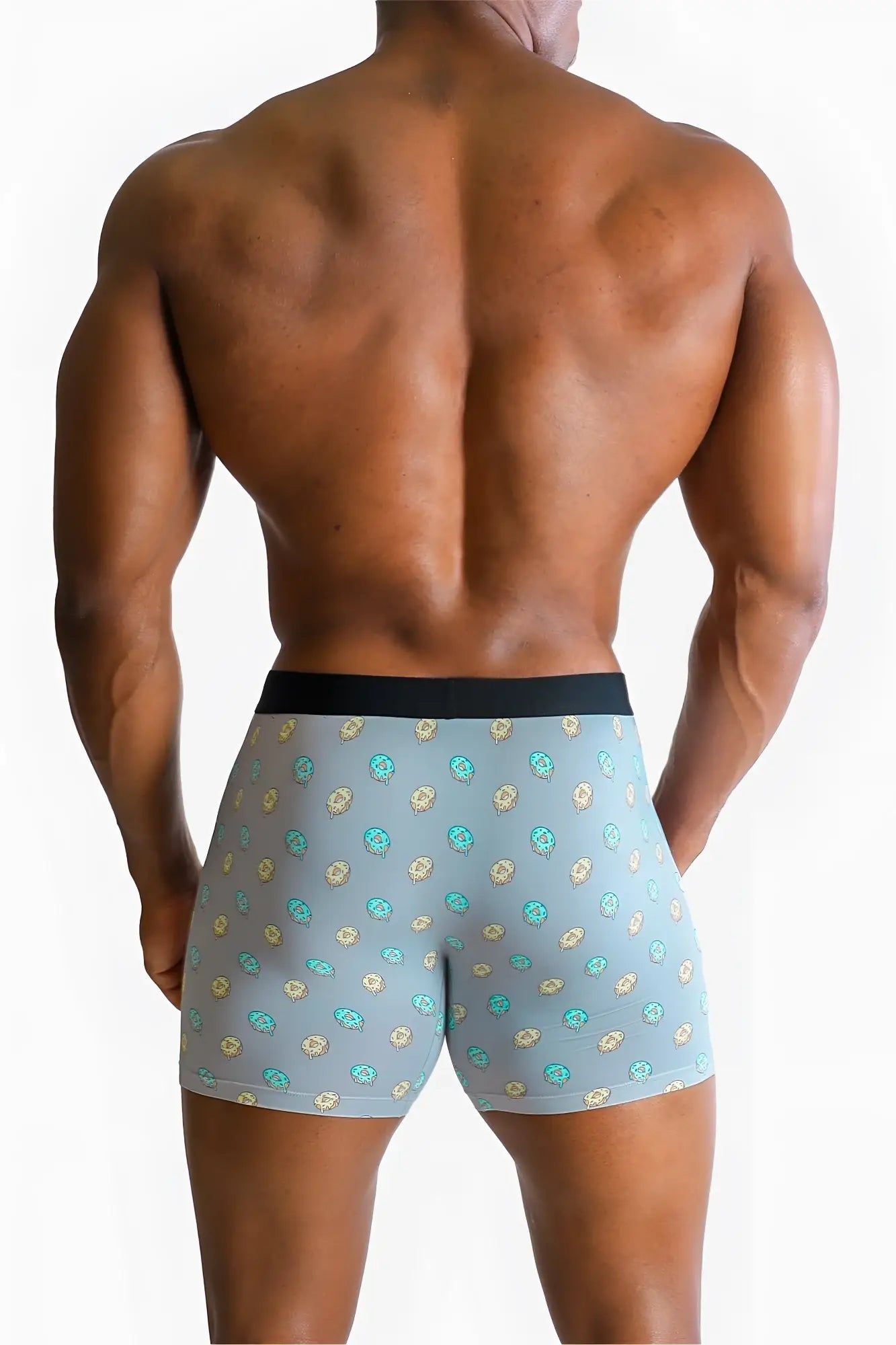 Men’s light blue boxer briefs with teal and beige skull pattern and solid black waistband from donuts collection