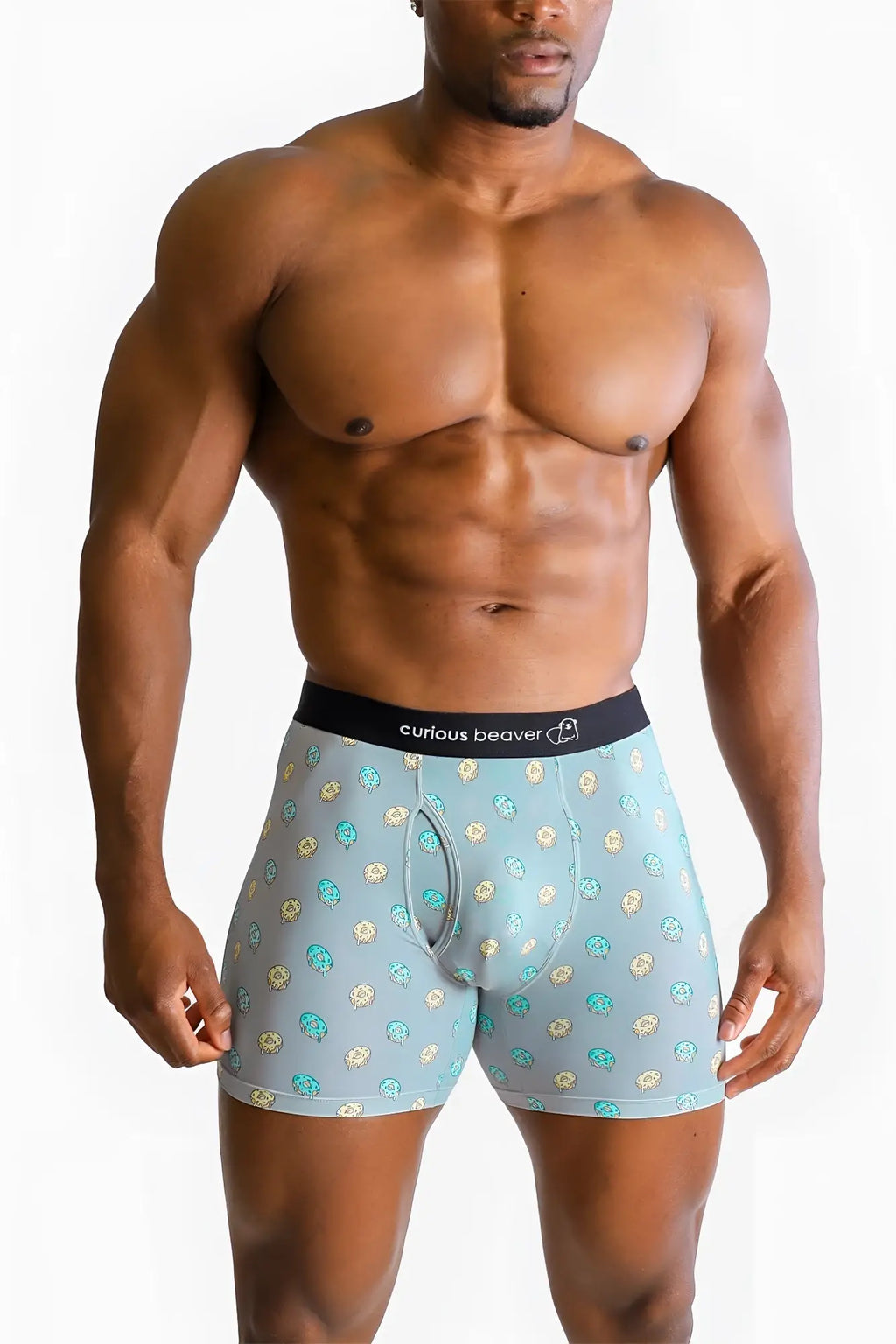 Men’s light blue boxer briefs with teal and gold cartoon beaver pattern and black curious beaver waistband
