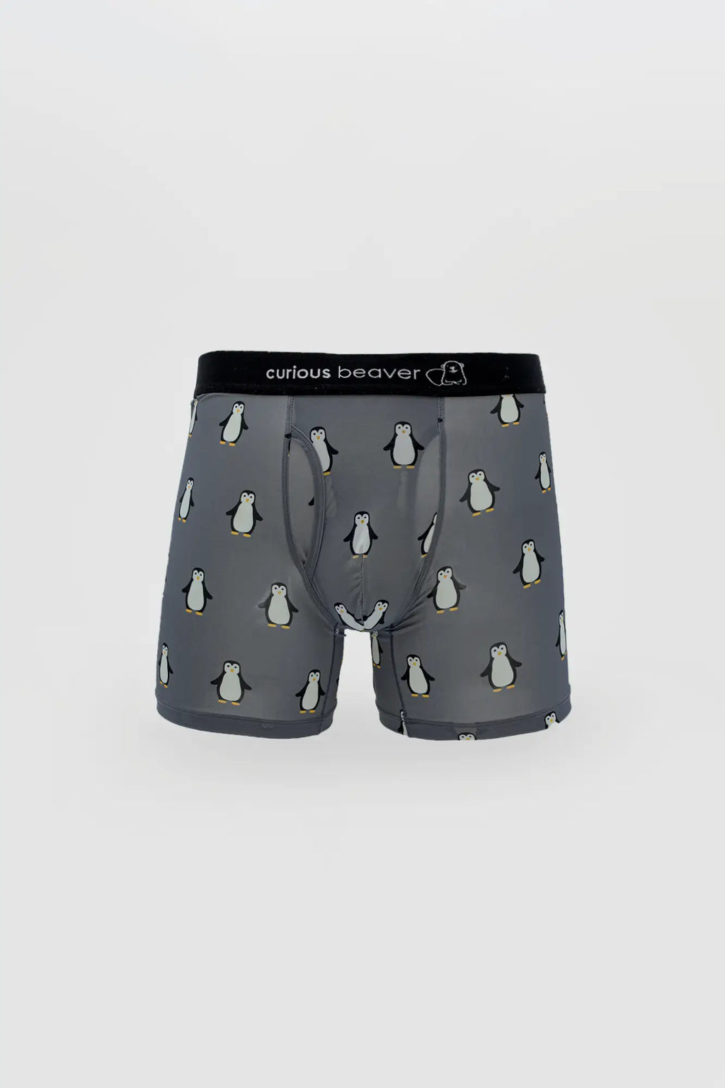 Men’s gray boxer briefs with cartoon penguin pattern and black curious beaver branded elastic waistband