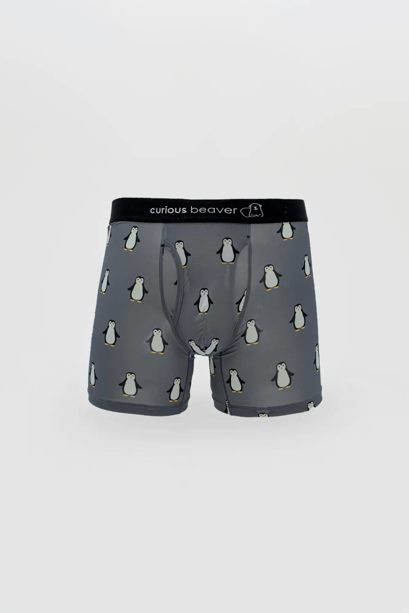 Men’s gray boxer briefs with cartoon penguin pattern and black curious beaver branded elastic waistband