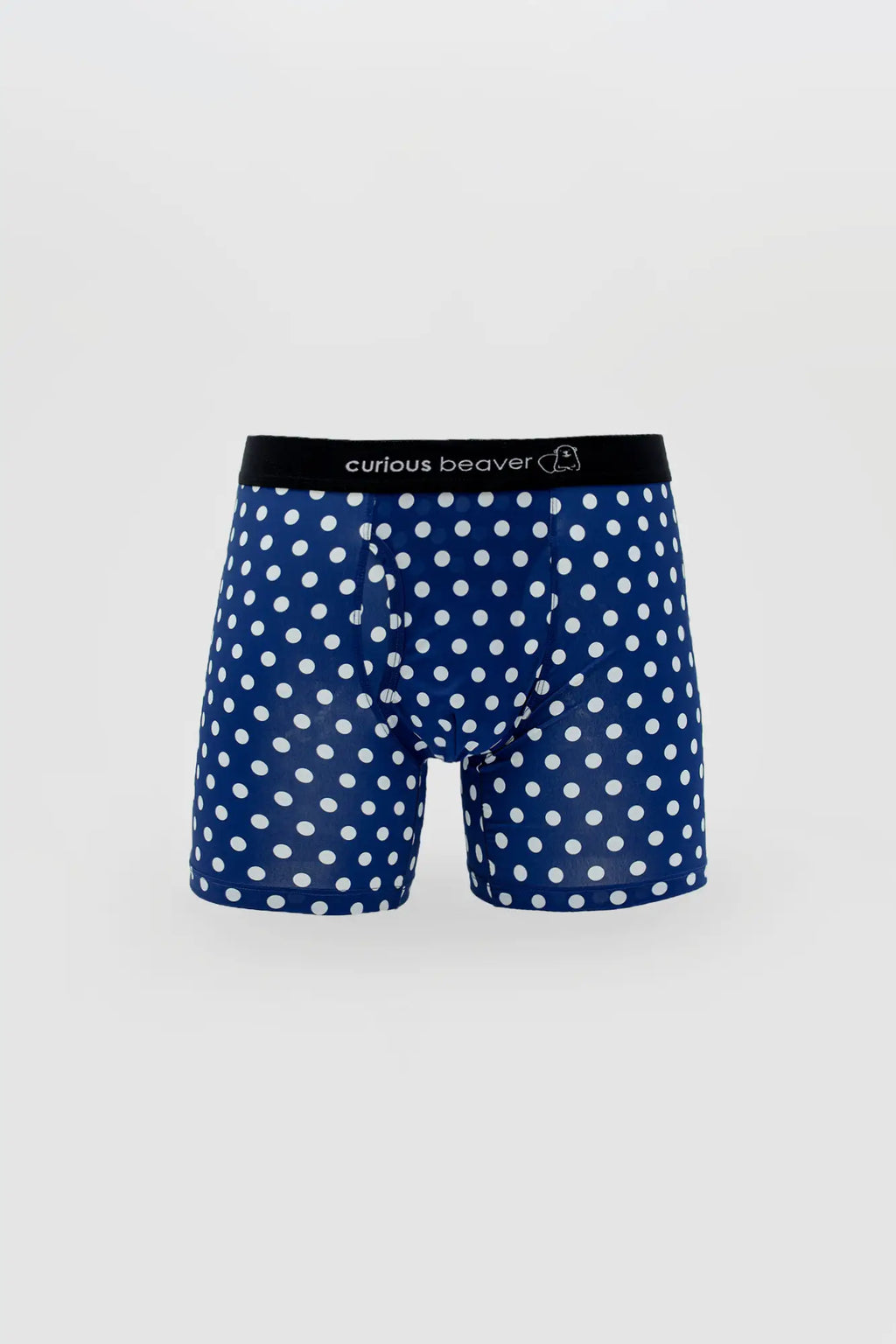 Men’s navy blue boxer briefs with white polka dots and a black waistband featuring the Curious Beaver logo