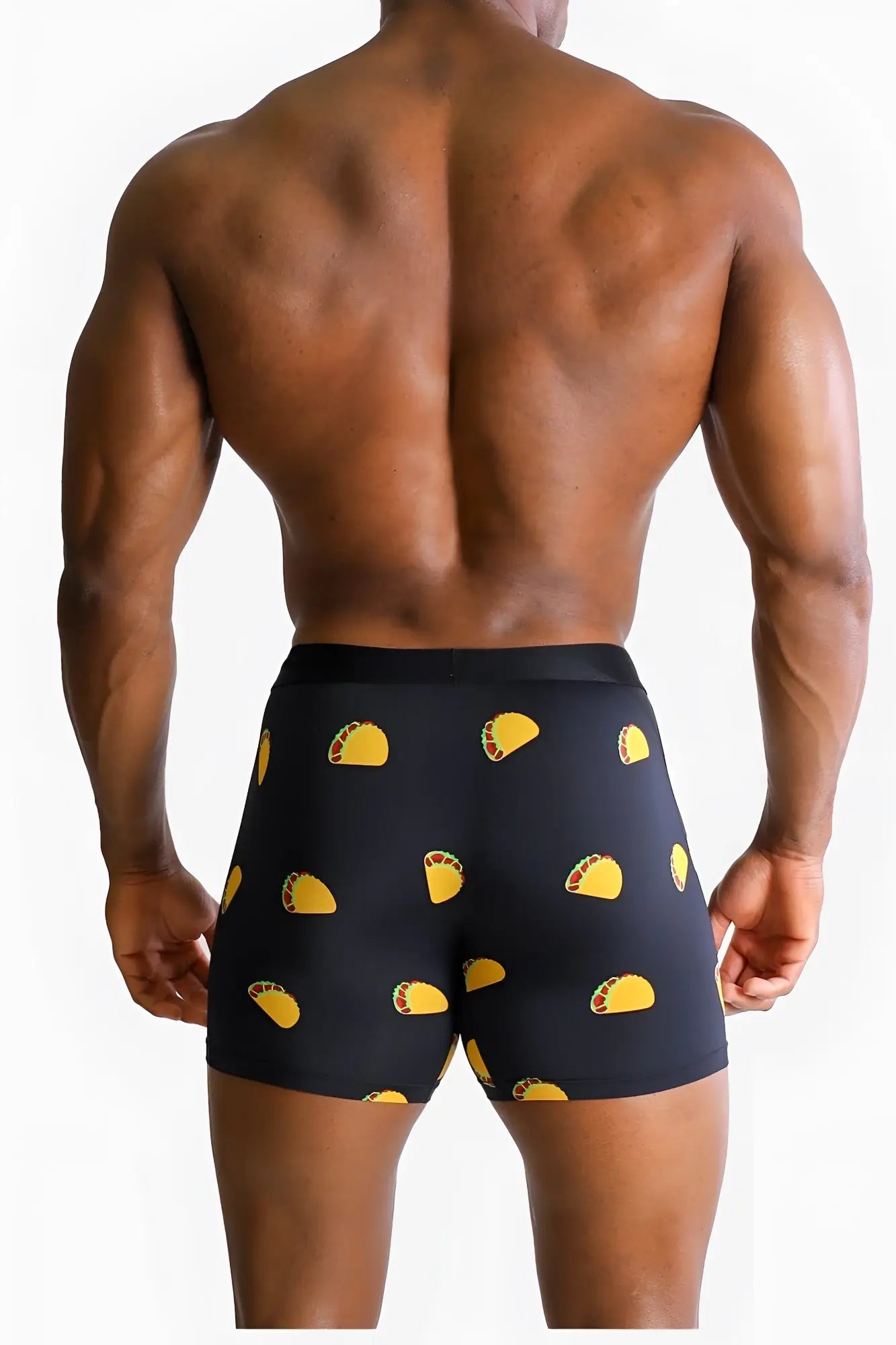 Men’s black boxer briefs made of soft fabric featuring a playful pattern of yellow tacos for everyday wear