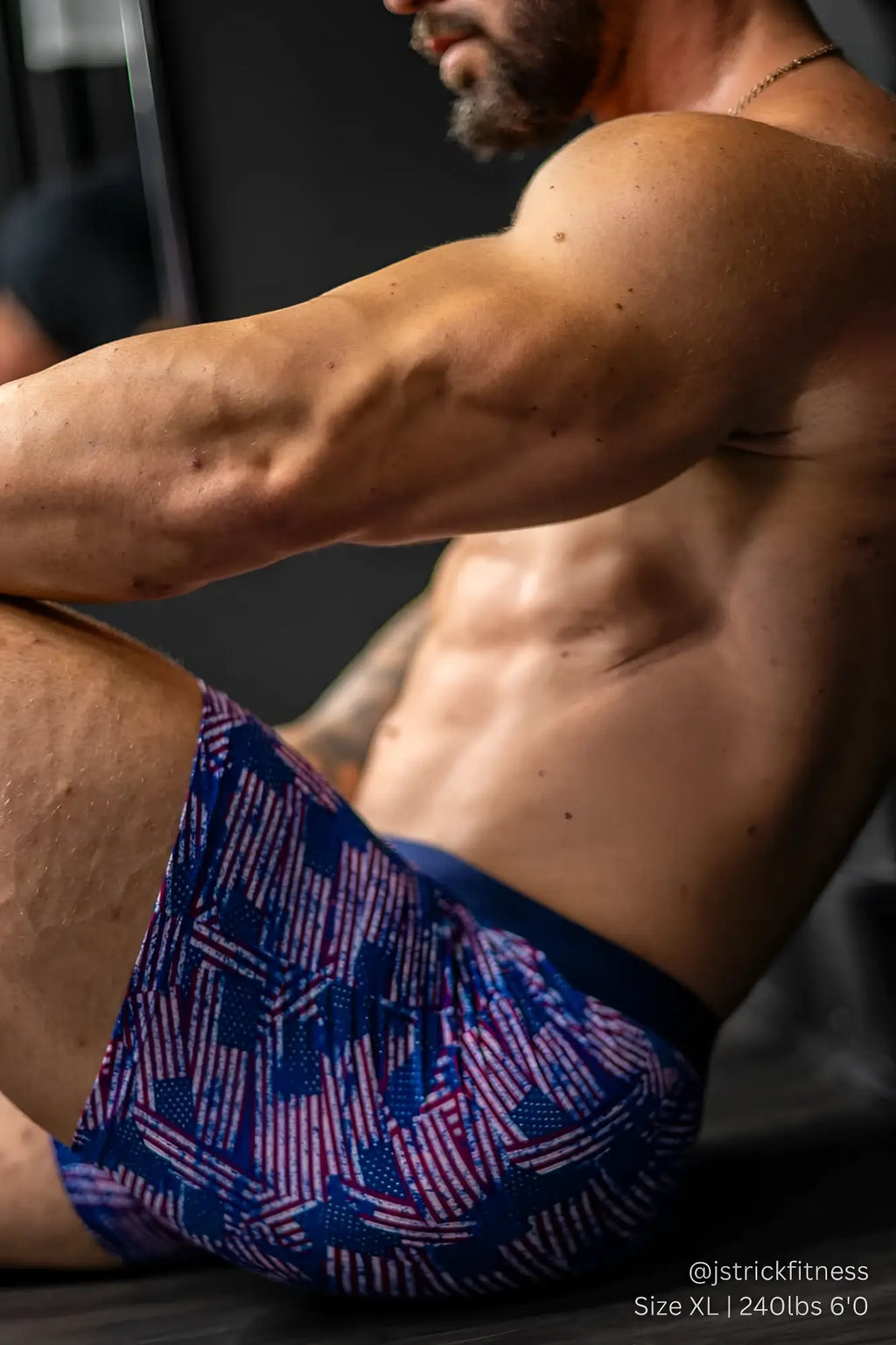 Men’s boxer briefs featuring a blue and red geometric american flag pattern designed for athletic comfort