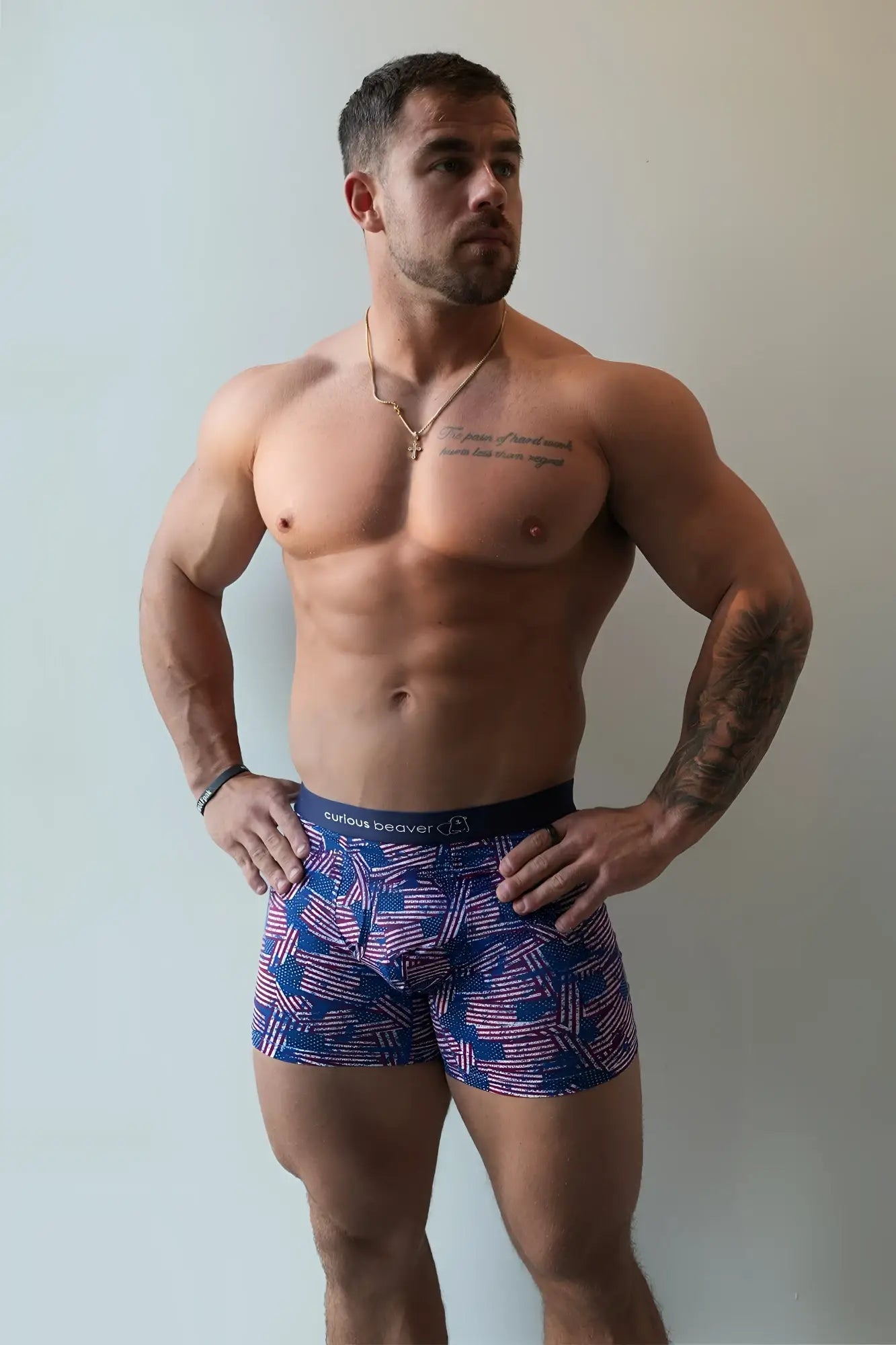 Men’s boxer briefs with blue and red usa flag pattern and black curious beaver waistband for comfortable wear