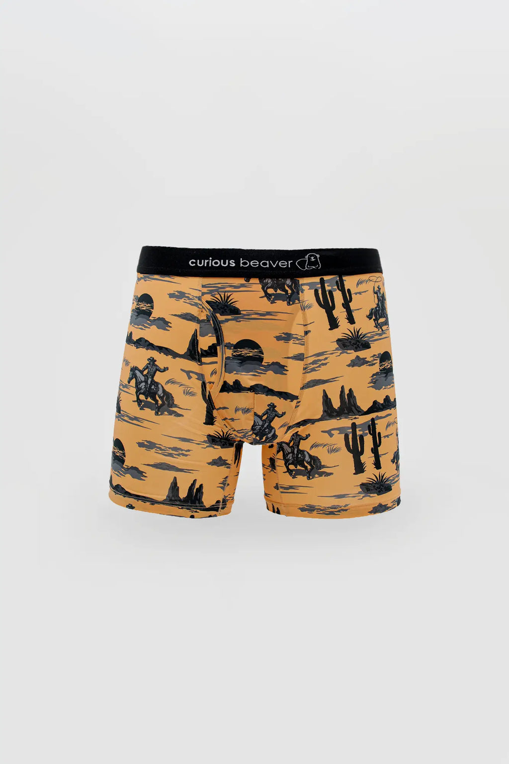 Men’s orange boxer briefs with black gray desert cowboy print and curious beaver logo on the waistband wild west style