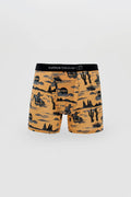 Men’s orange boxer briefs with black gray desert cowboy print and curious beaver logo on the waistband wild west style
