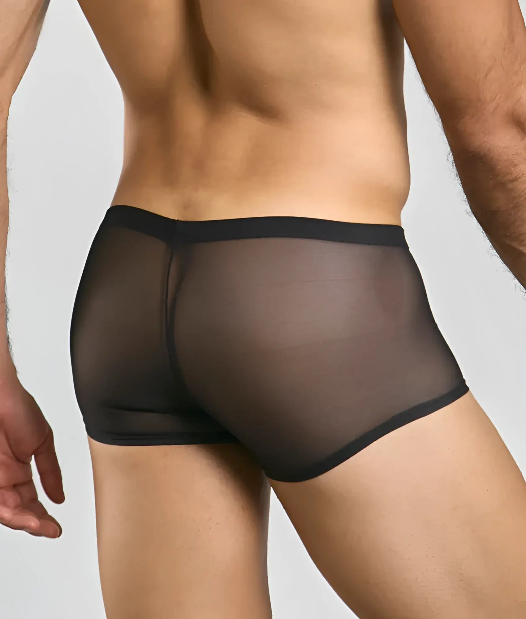 Mens mesh lace pouch trunk in black sheer mesh with solid black waistband front view