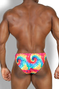 Men’s slimmer bulge briefs in vibrant rainbow tie dye with a swirling spiral pattern perfect for swimwear
