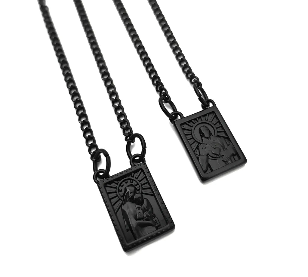 Black stainless steel men’s scapular necklace with rectangular pendant engraved religious figures and sunburst designs