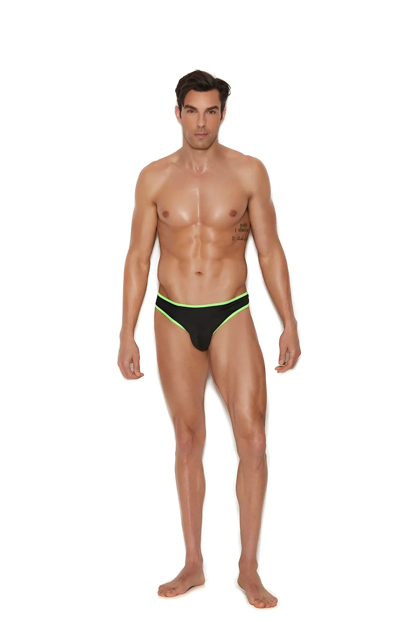 Men’s black thong with neon green trim showing the front side made of soft breathable fabric
