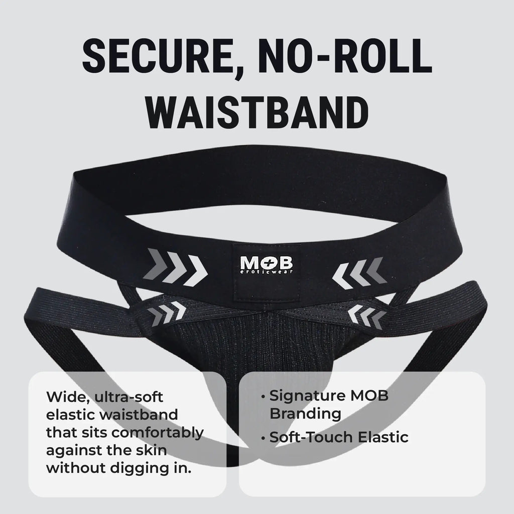 Black elastic waistband with white arrows and mob eroticwear branding on men’s x jockstrap back side