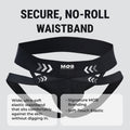 Black elastic waistband with white arrows and mob eroticwear branding on men’s x jockstrap back side