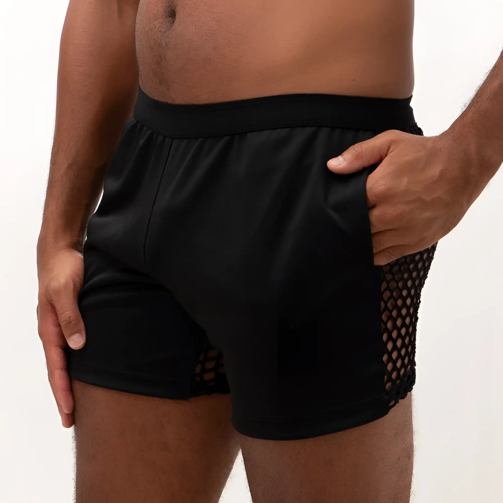 Black mesh back short with solid fabric waistband and breathable mesh paneling on the sides for athletic use