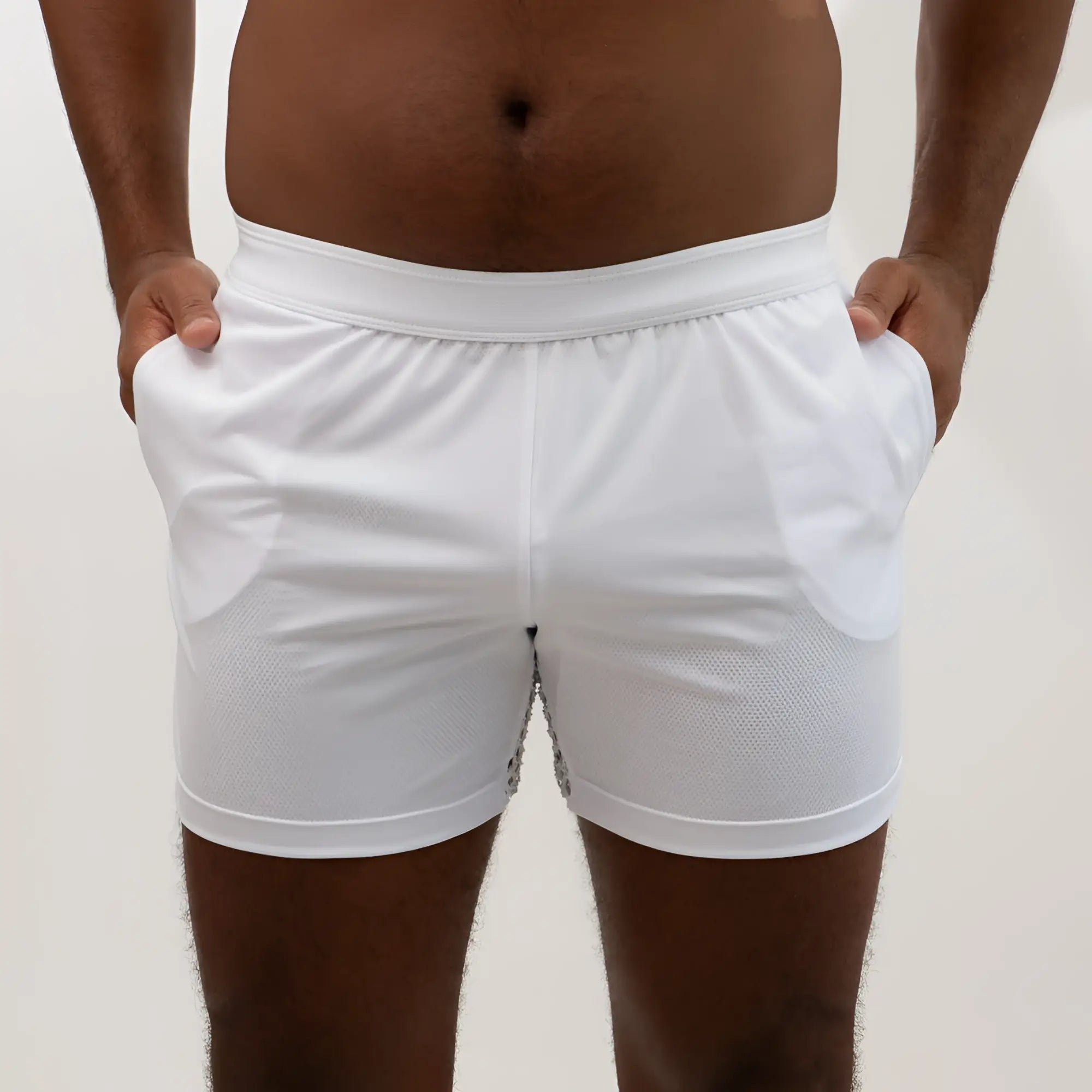 White mesh back short with textured mesh fabric and subtle side panel detailing for athletic wear