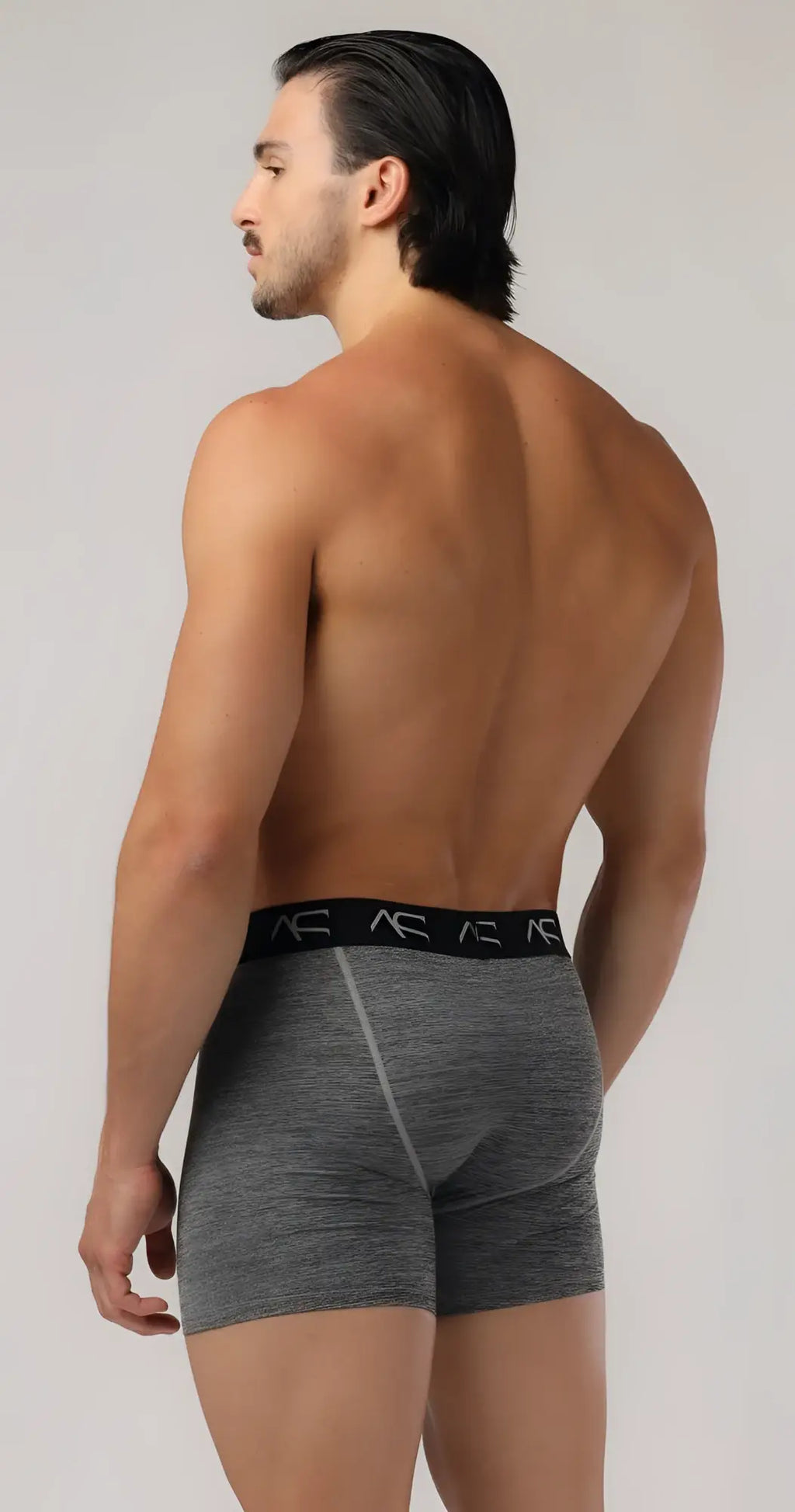 Gray heathered mesh combo trunks boxer briefs with black elastic waistband featuring ae logo in front view