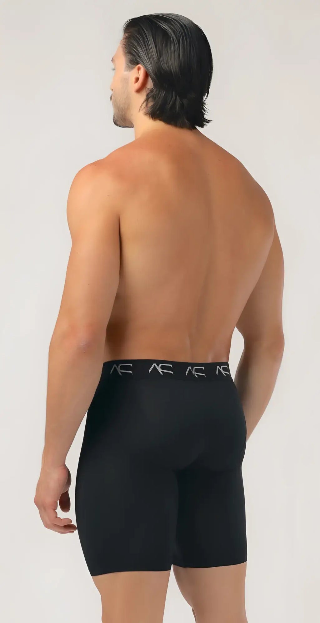 Black mesh long trunks athletic briefs with subtle white logo pattern on waistband front view