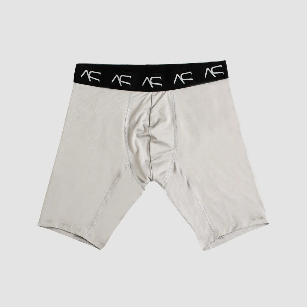 Light gray mesh long trunks with black waistband featuring white ac logos designed as athletic briefs