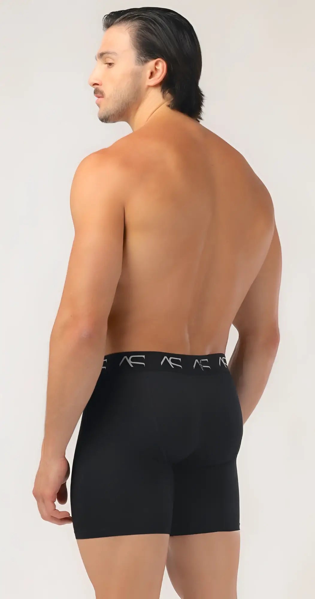 Black men’s mesh short trunks boxer briefs with subtle repeating logo pattern on waistband