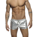 Shiny silver metallic short swim trunks with drawstring waistband and small logo on lower right leg
