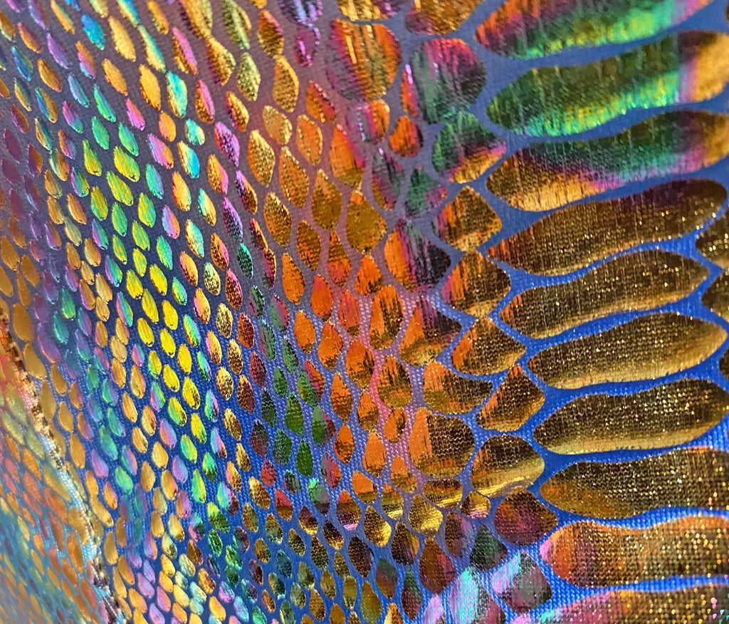 Metallic snake pocket shorts featuring iridescent holographic fabric with shimmering rainbow scale-like pattern