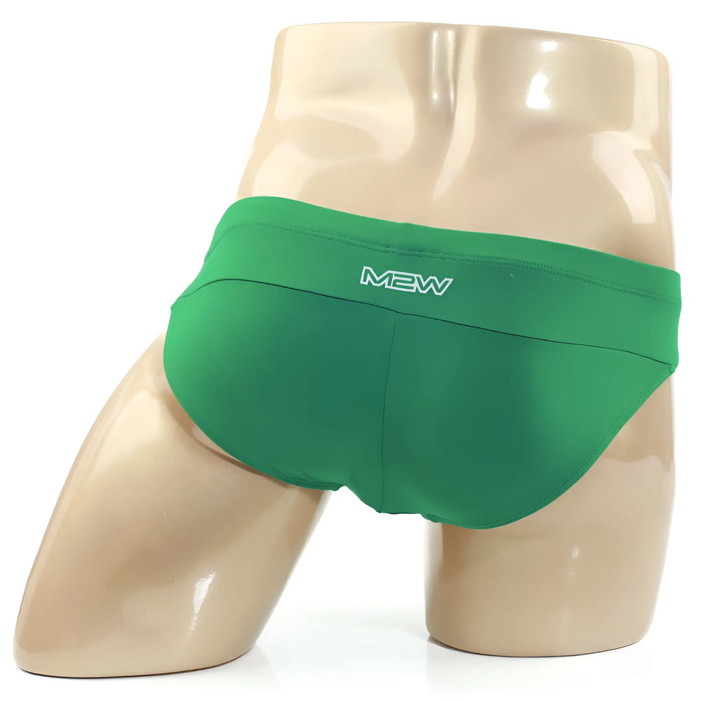 MetroMaleWear Aluche bikini briefs in green displayed on a mannequin highlighting the stylish design and fit
