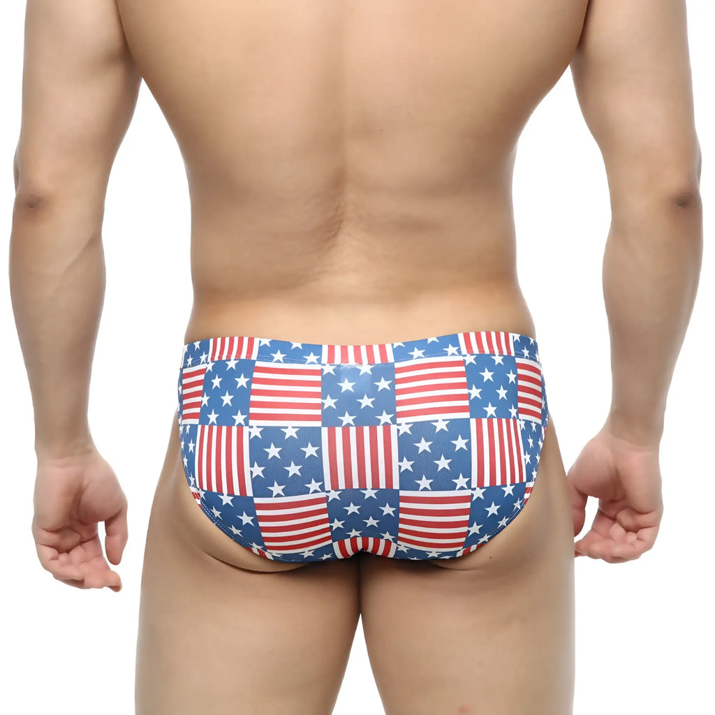 MetroMalewear america bikini 5103-97 swim trunks feature a red white and blue american flag patchwork design