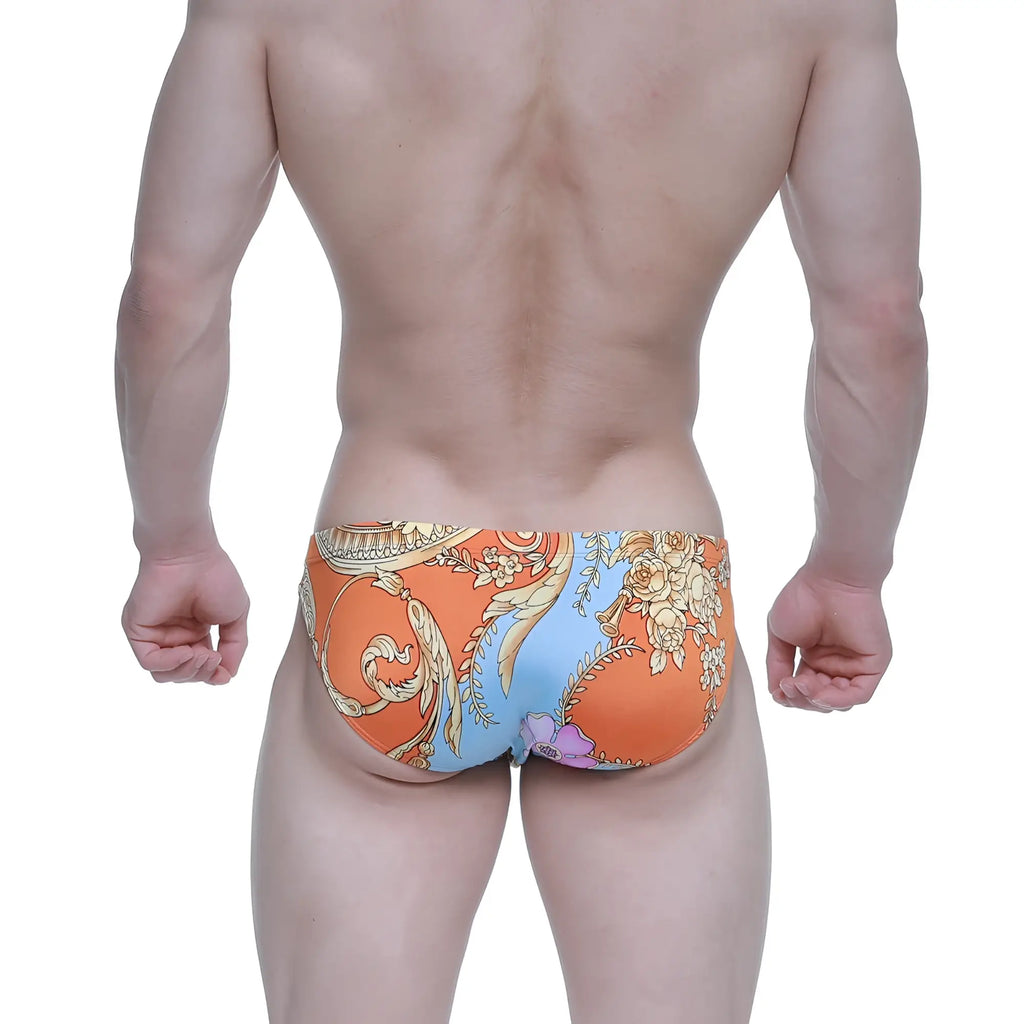 Orange and blue patterned swim trunks with ornate floral design metro malewear antique bikini 5103-m68