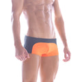MetroMaleWear Arc swim boxer in bright orange and navy blue with modern two-tone design for swimming and beachwear