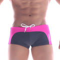 MetroMaleWear Arc swim boxer pink features bright pink and black fabric with a white drawstring waistband