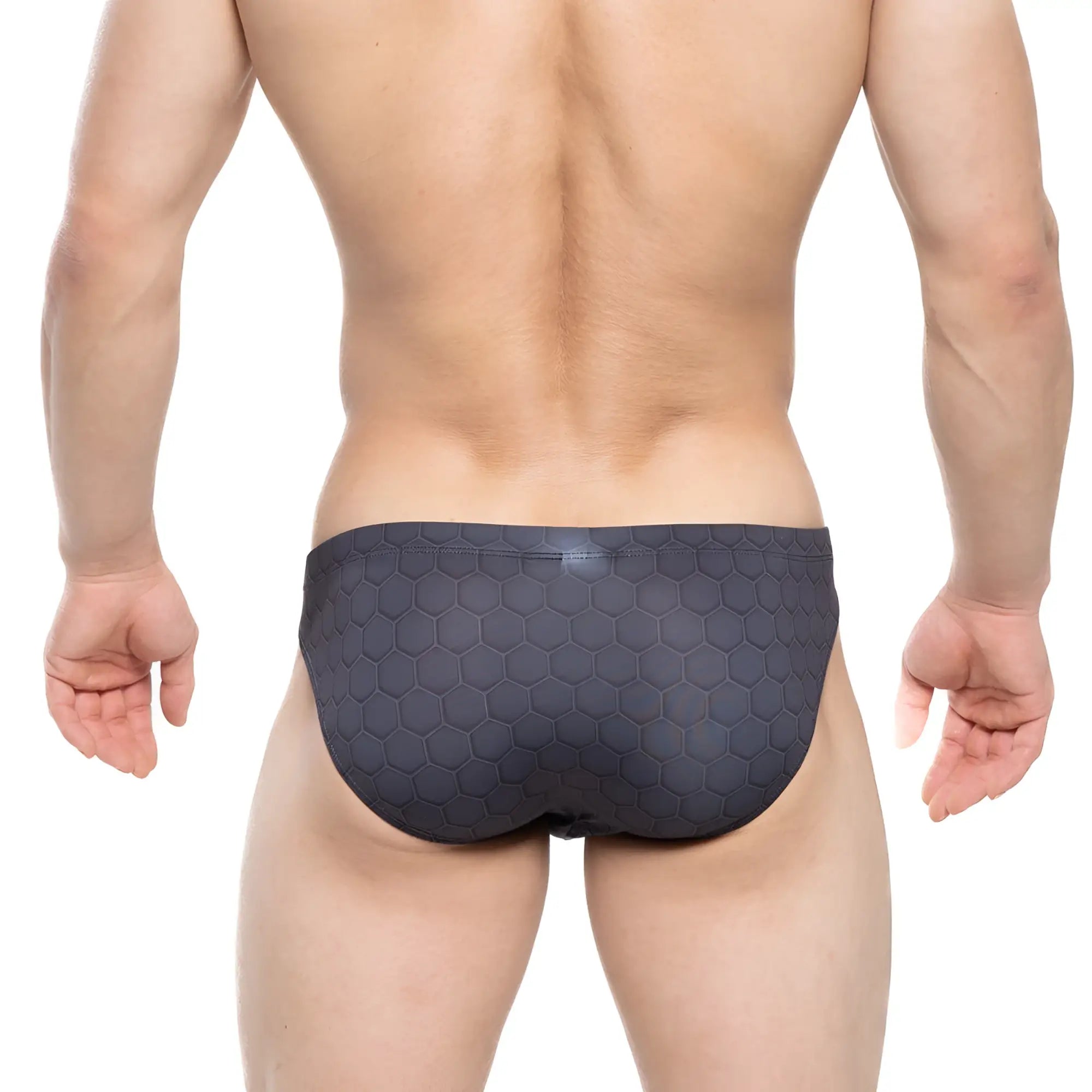 Dark gray swim trunks by Metromalewear with textured hexagonal pattern designed for comfortable swimwear use