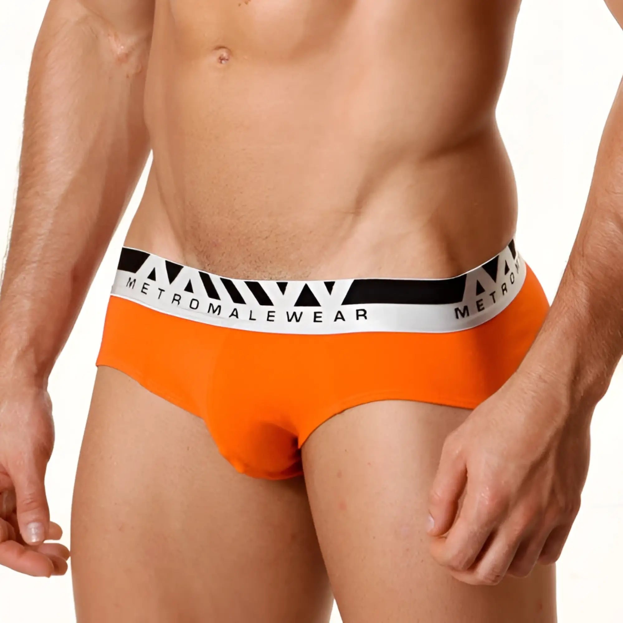 Bright orange metro malewear asian brief with white and black elastic waistband and metromalewear logo