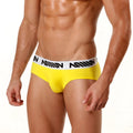 Bright yellow metro male wear asian briefs with white elastic waistband and black logo text for men