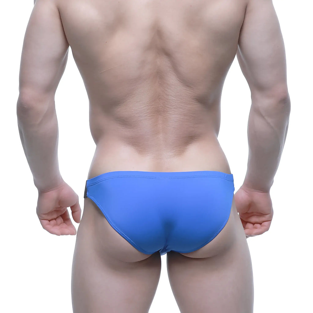 Bright blue metroMalewear beatnik bikini royal swim trunks with sleek form-fitting design for men