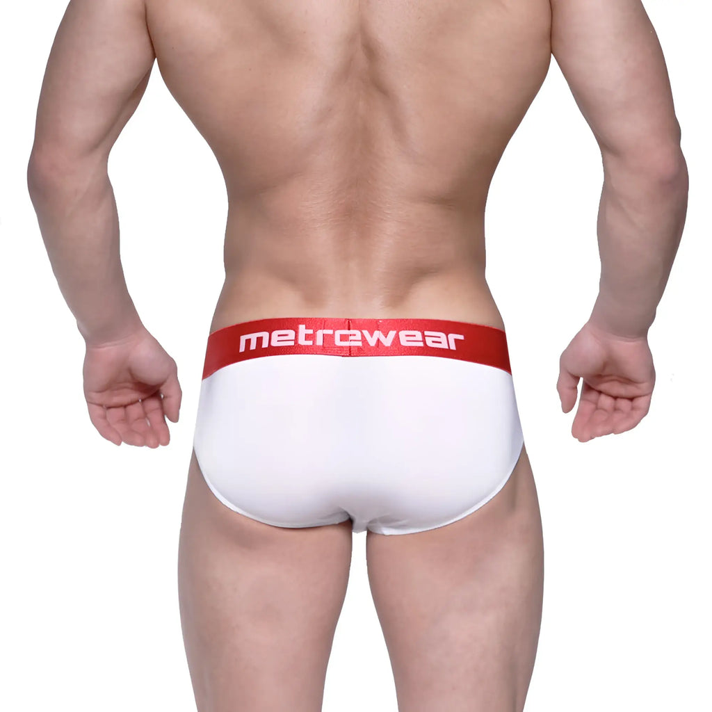 White men’s briefs with a red waistband featuring the metrewear logo in white lettering metro malewear benjamin hip brief
