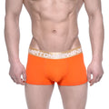 Bright orange MetroMaleWear body boxer briefs with gold waistband and white logo for comfortable daily wear