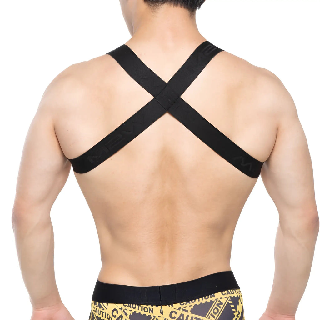 Black cross-back Brutal Harness athletic support strap by MetroMaleWear with subtle embossed branding on the back side