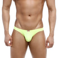 Bright lime green seamless fabric briefs with red and white metroMalewear tag at waistband metroMalewear bulge capri bikini