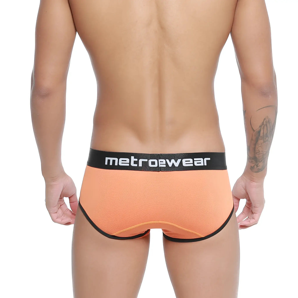 MetroMalewear Cairo brief orange mesh with black elastic waistband and white metrowear branding front view