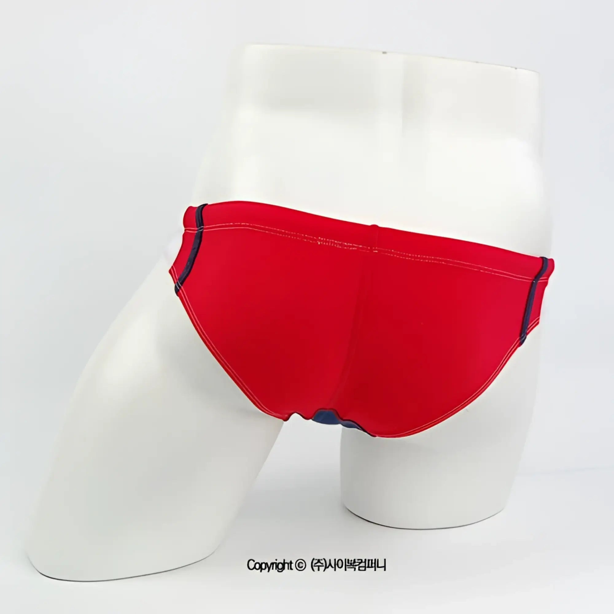 Red swim bikini by metromalewear california featuring navy blue trim and stitching ideal for beachwear