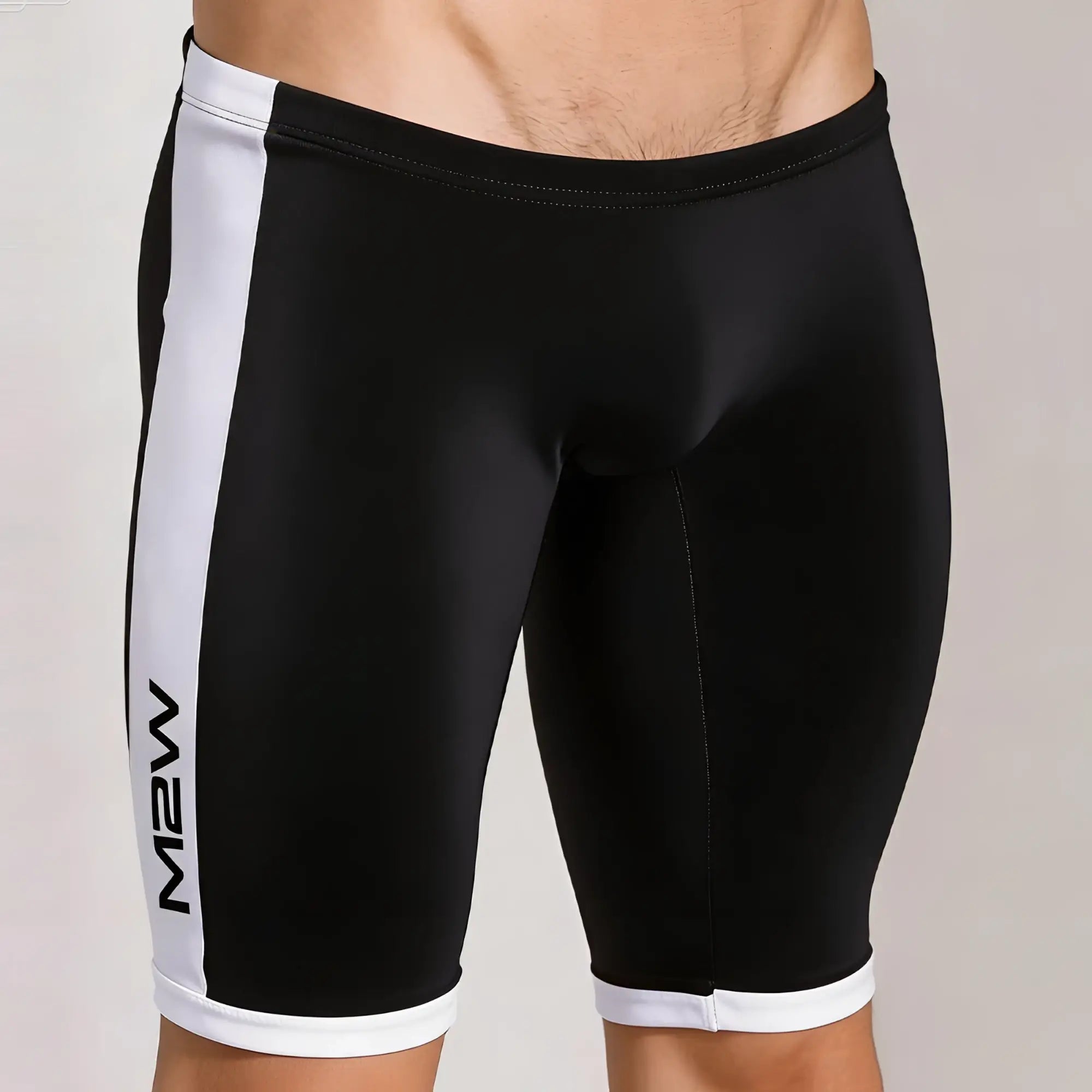 Black and white metroMalewear campus jammer athletic shorts with vertical white stripes and m2w branding on left leg