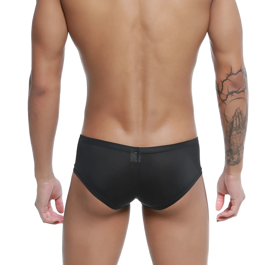 Back view of metro malewear cannon boxer black swim trunks with subtle sheen and small rectangular tag on waistband