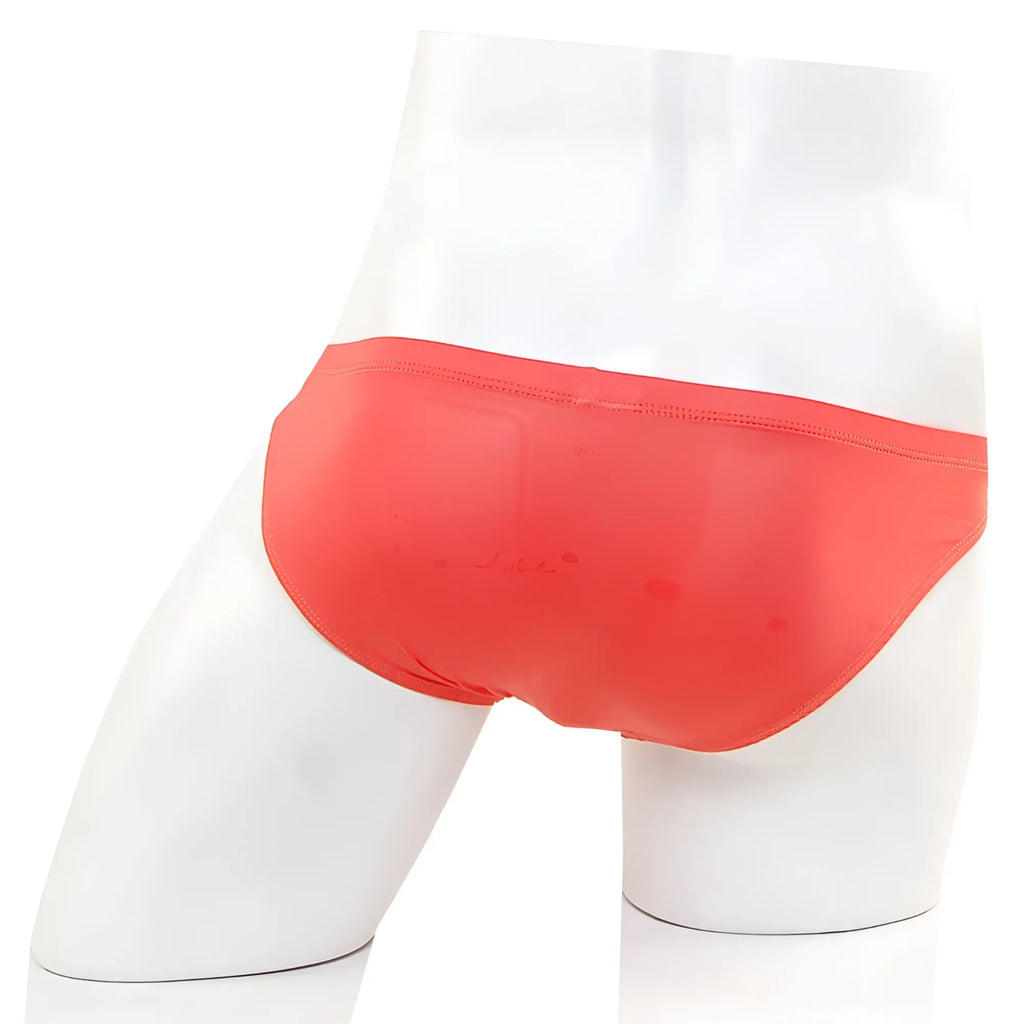Bright coral metroMalewear cannon hip brief swim trunks with smooth stretchy fabric and sleek design