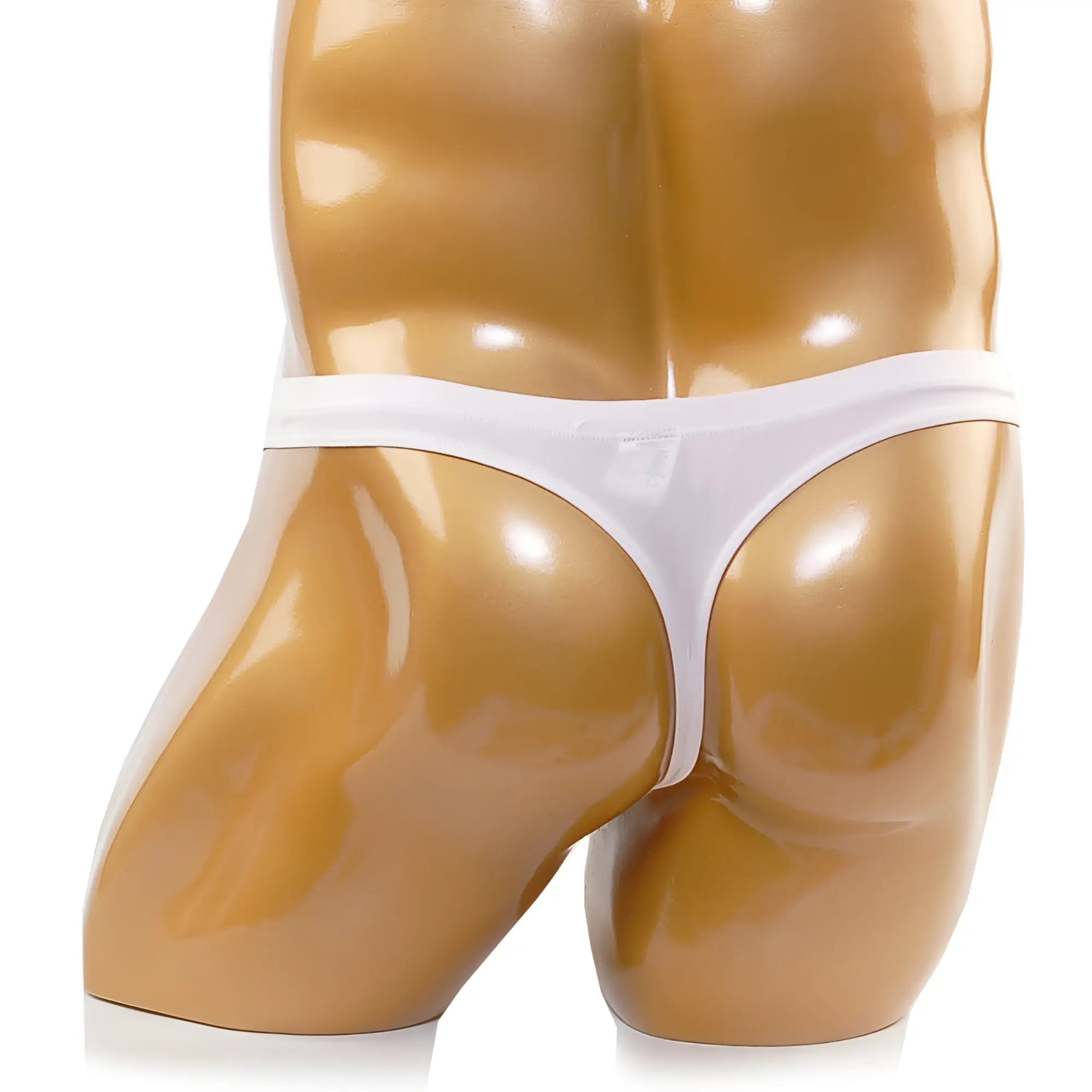 White thong in nude color displayed on a glossy mannequin torso from MetroMaleWear Cannon Thong 2202-02