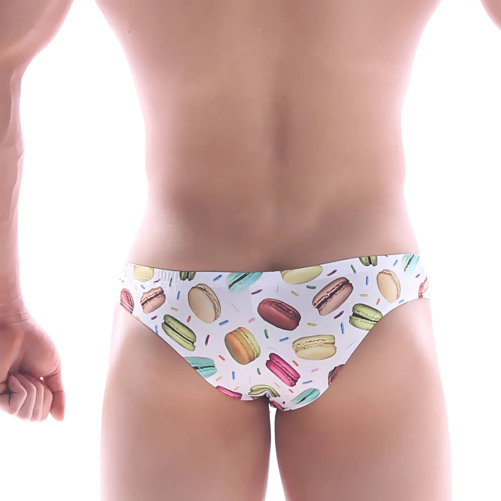 White swim trunks by metromalewear featuring a playful macaron and sprinkle pattern for stylish beachwear