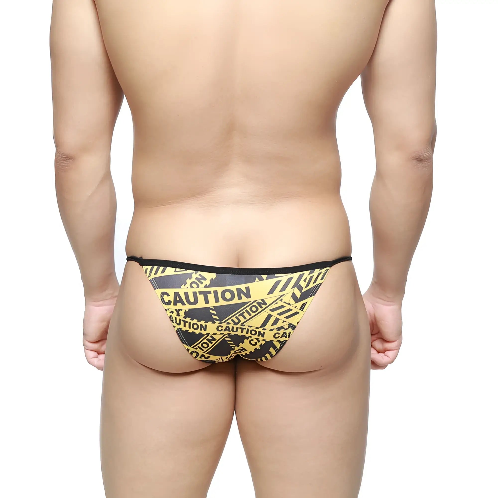 MetroMaleWear caution string bikini black 2005-61 men’s briefs with black and yellow caution tape pattern