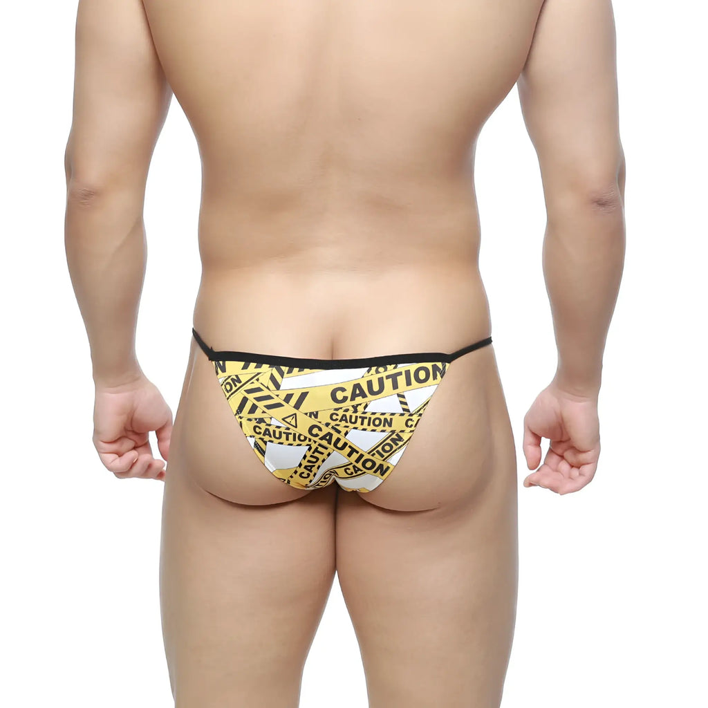 MetroMaleWear caution string bikini in yellow and white caution tape pattern with black trim front view
