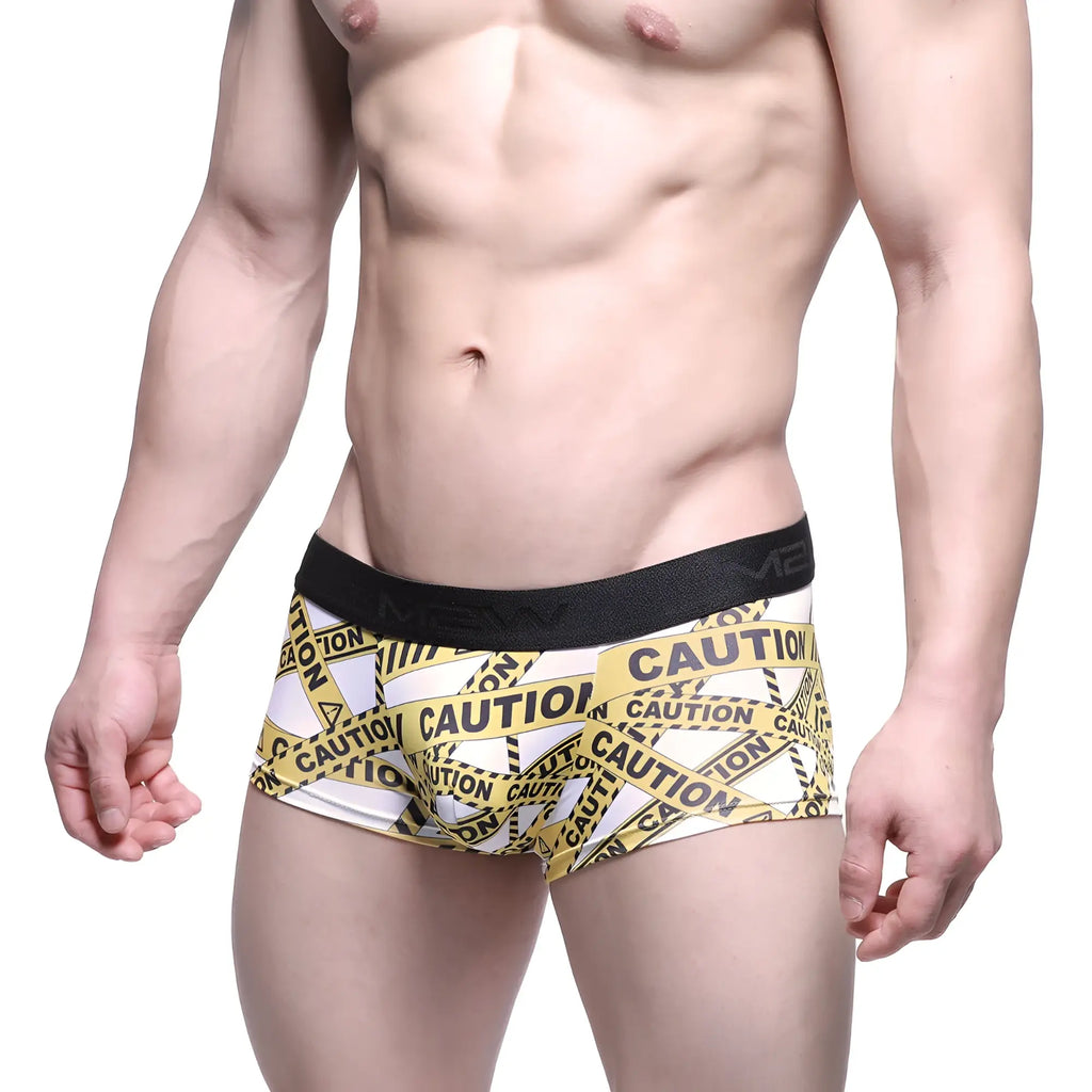 White boxer briefs metro male wear caution trunk 2026-69 with bold yellow and black caution tape pattern and black waistband